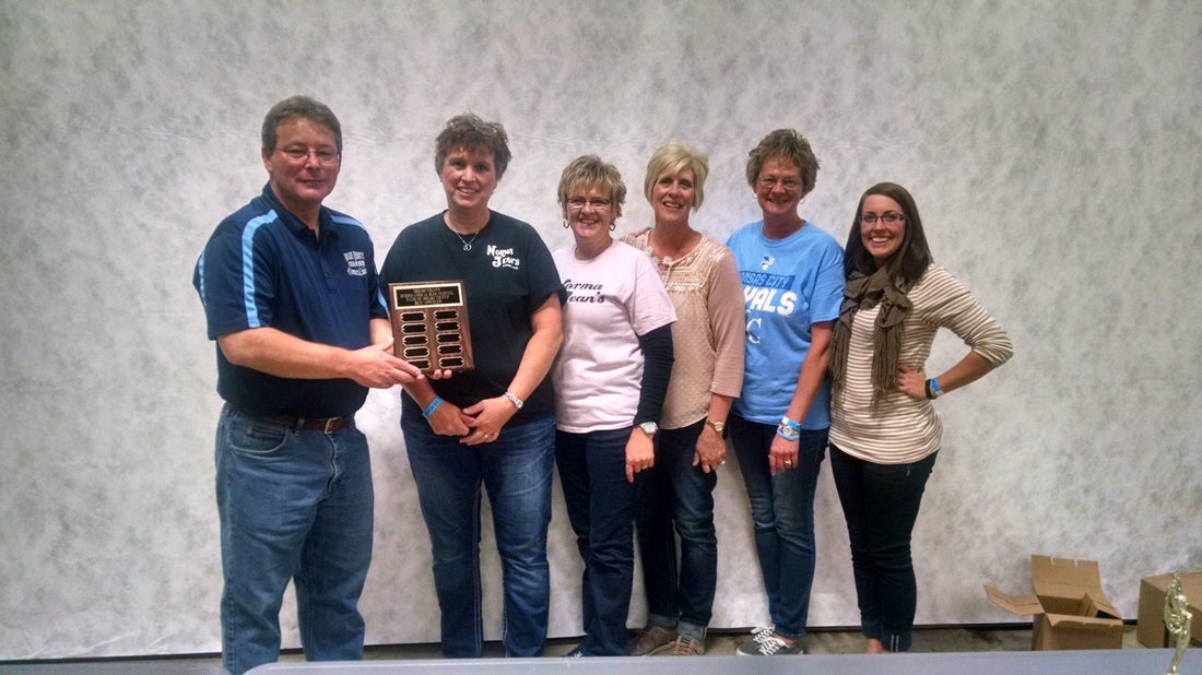 Picture of Norman Jean's restaurant from Panama receiving the 1st place award for the Shelby County Chamber of Commerce's International Beer Festival Best Appetizer contest.